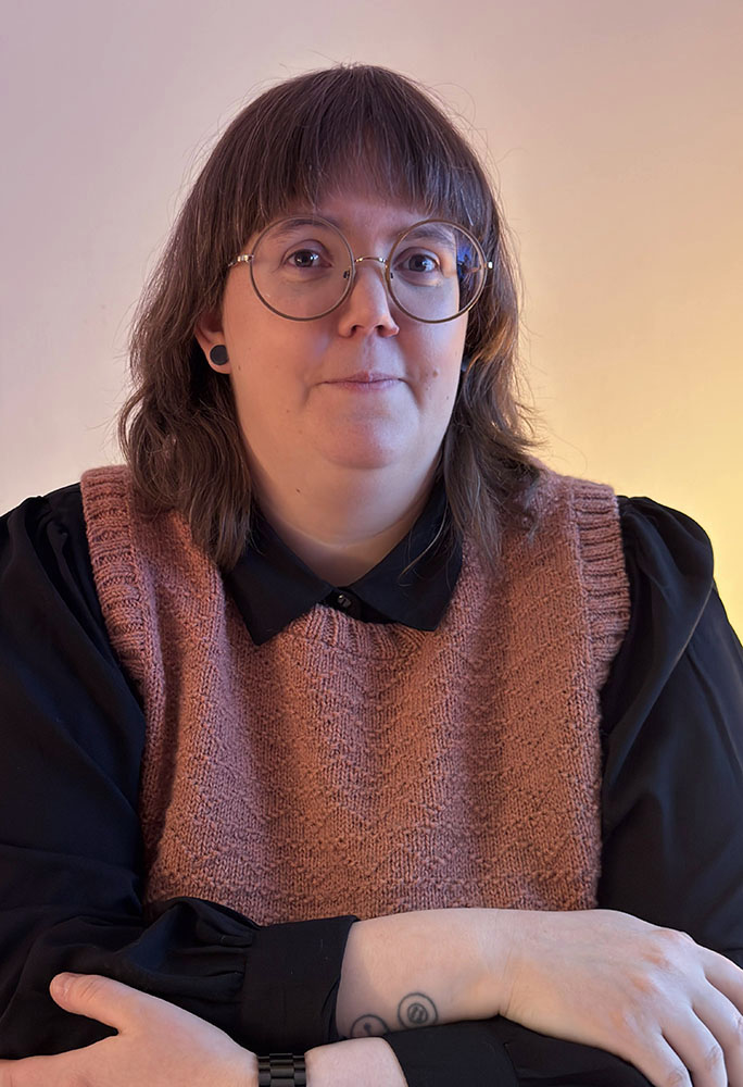 Woman looking into camera and smiling